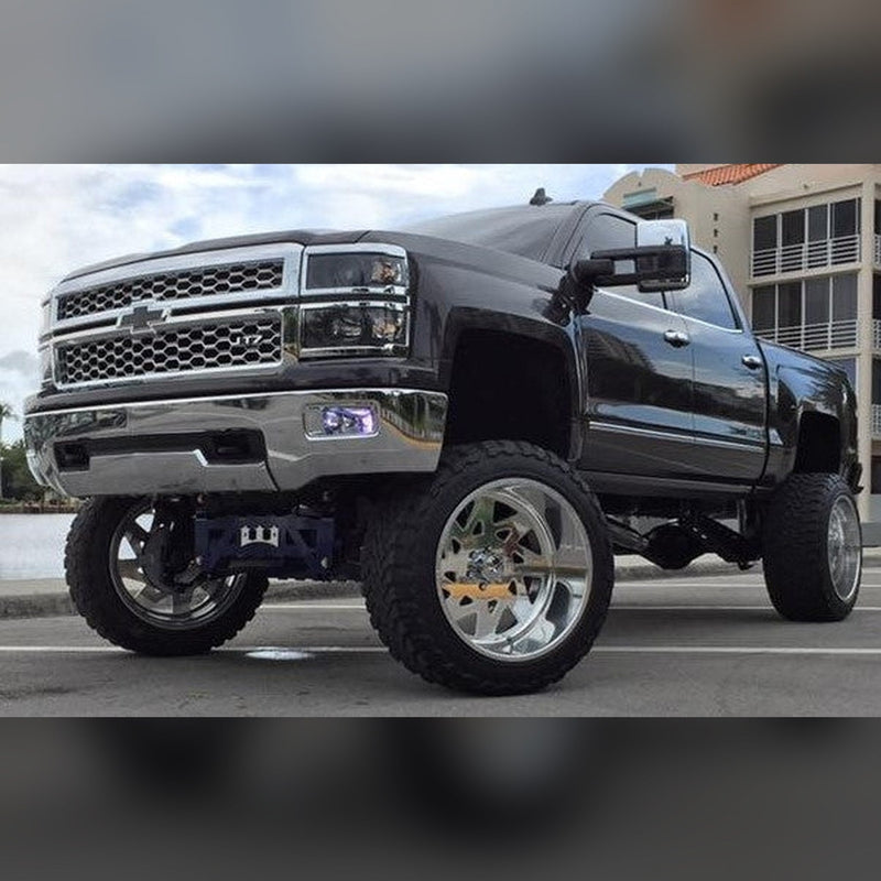 2014-2018 Chevy Silverado 1500 with 1/2" & 3/4" front bumper spacer kit installed — bolt-on, no-cut tire clearance