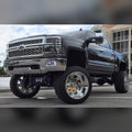 2014-2018 Chevy Silverado 1500 with 1/2" & 3/4" front bumper spacer kit installed — bolt-on, no-cut tire clearance