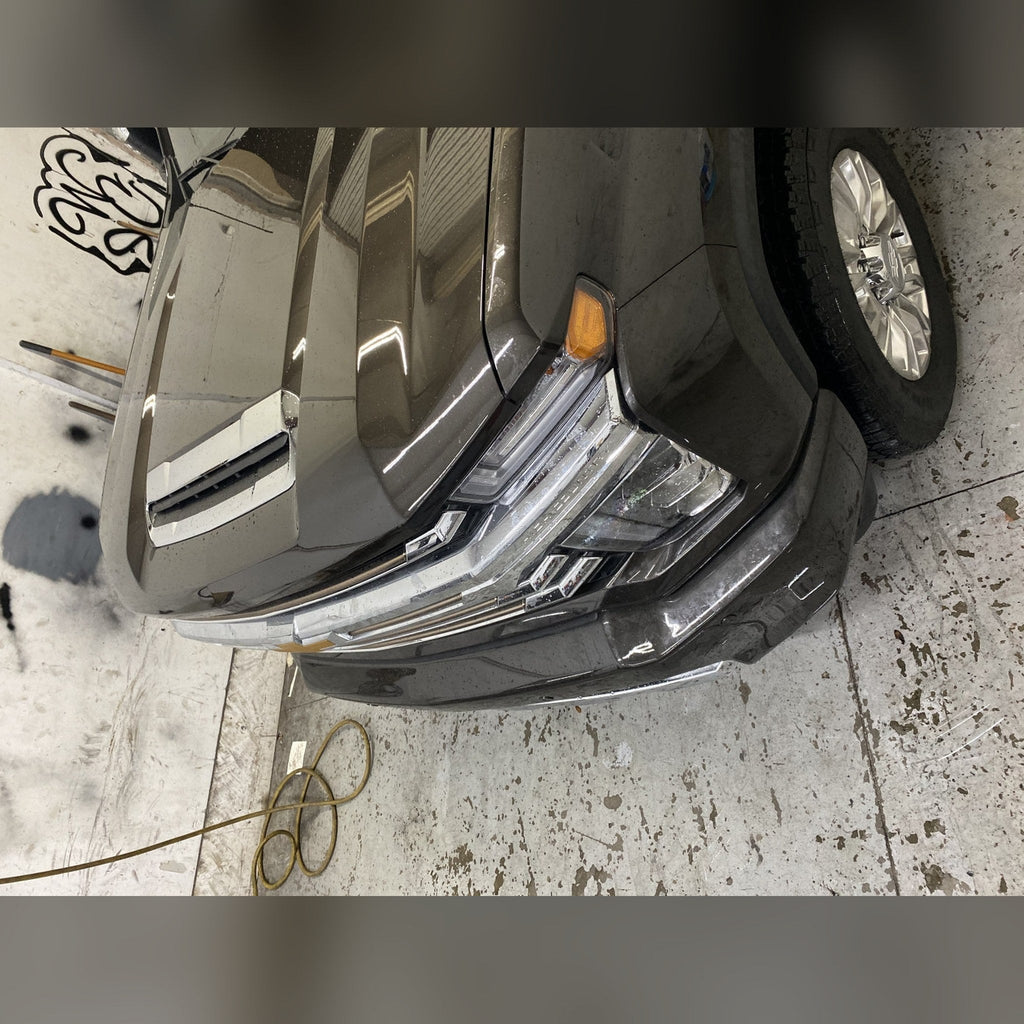 2020+ Chevy Silverado 2500HD/3500HD 3/4" front bumper spacer kit — installed view 2 showing bumper and tire clearance