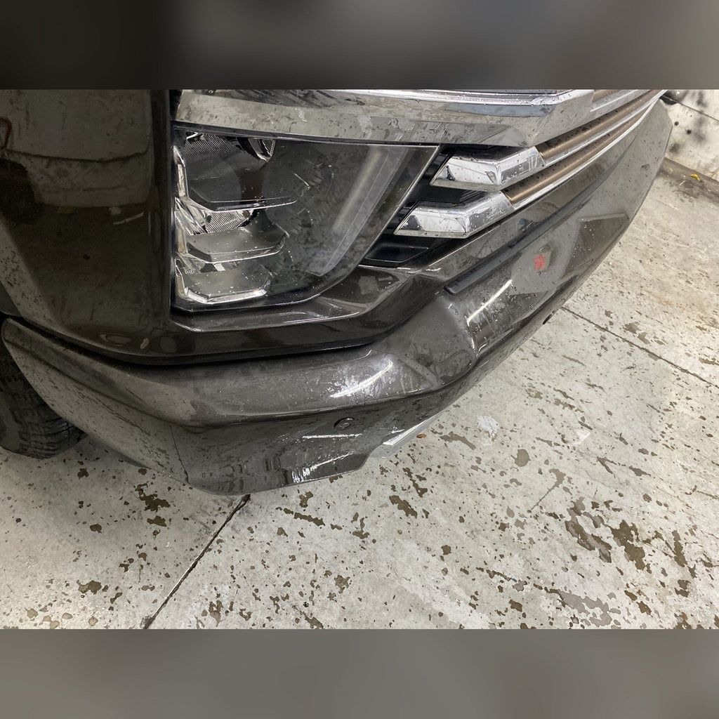 2020+ Chevy Silverado 2500HD/3500HD 3/4" front bumper spacer kit — installed view 4 showing bumper and tire clearance