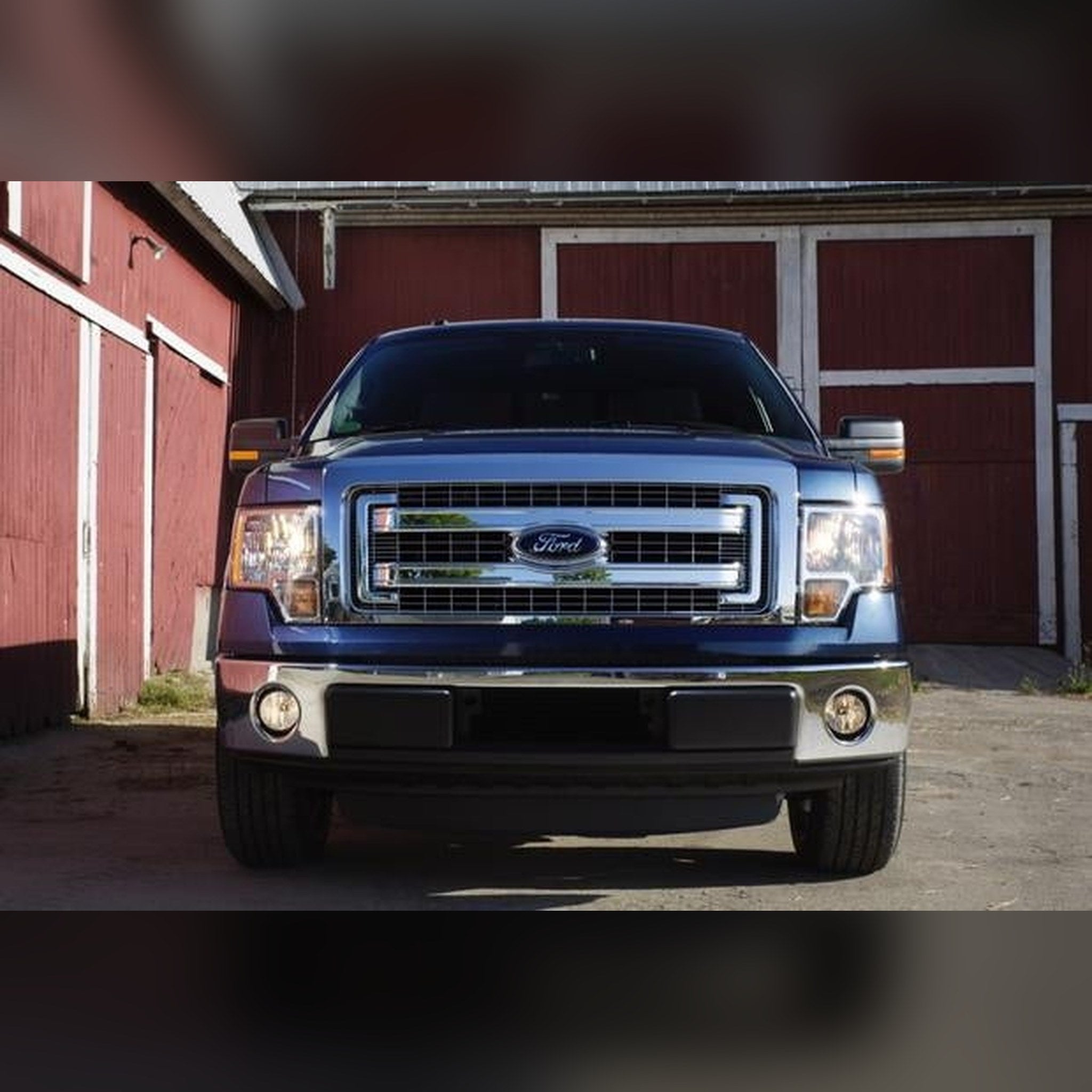 2009-2014 Ford F-150 with 3/4" front bumper spacer kit installed — bolt-on, no-cut tire clearance