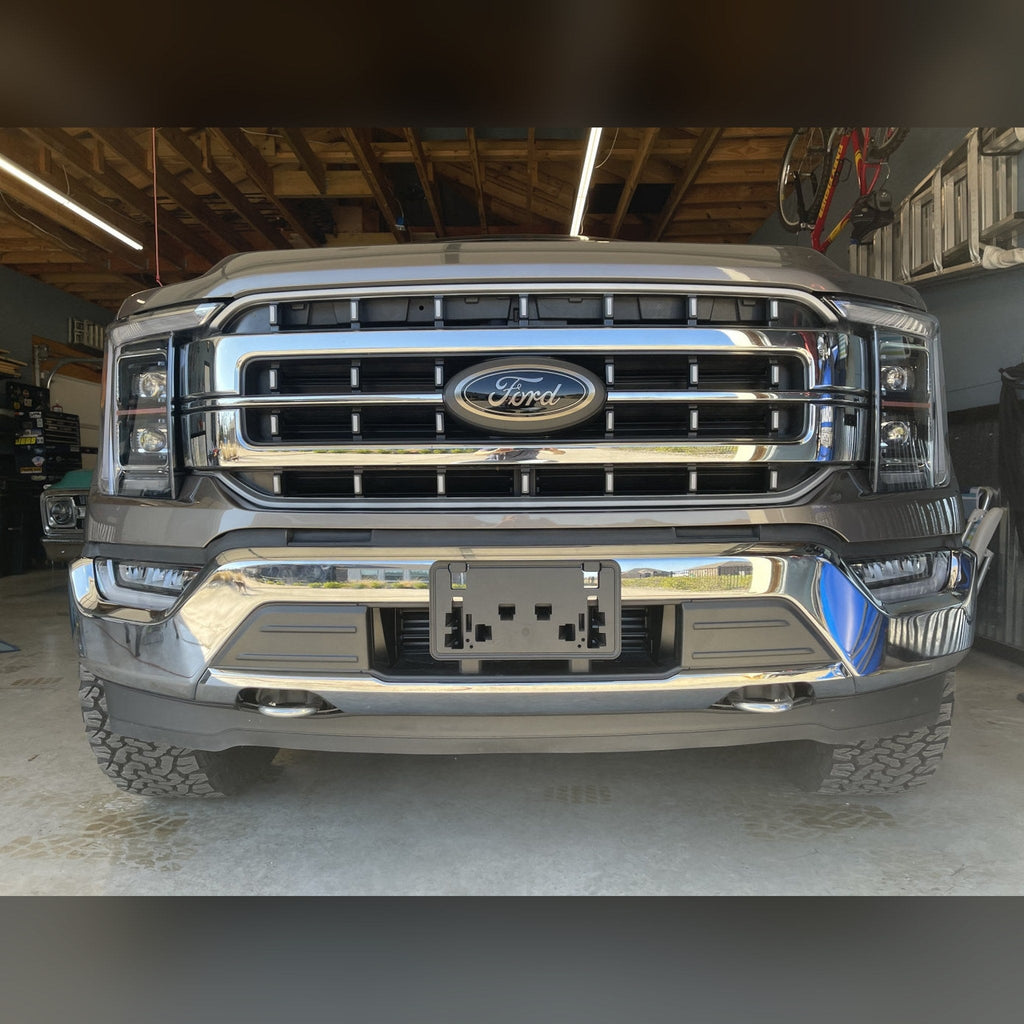 2021+ Ford F-150 3/4" front bumper spacer kit — installed view 2 showing bumper and tire clearance