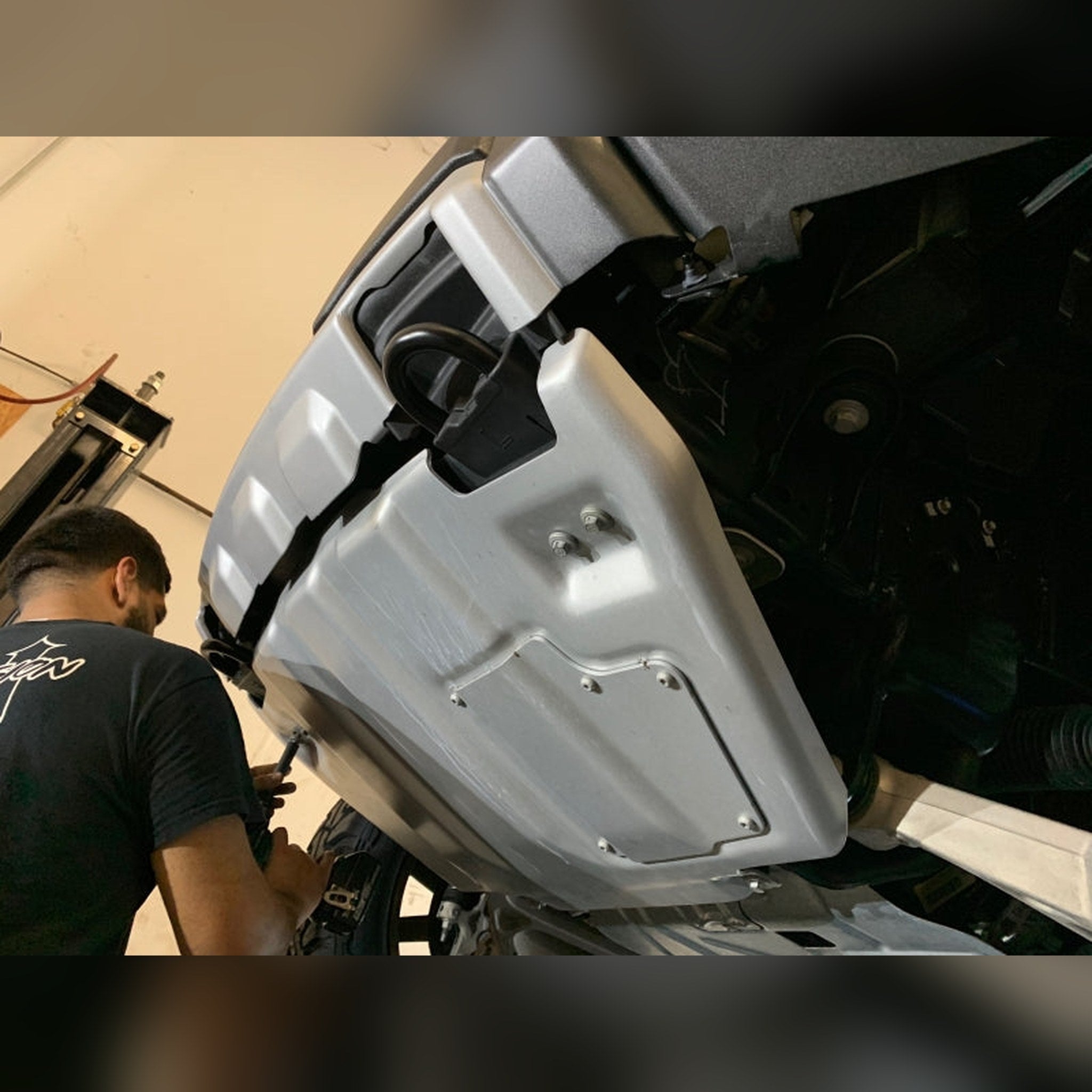 2018-2020 Ford F-150 Raptor 3/4" front bumper spacer kit — installed view 5 showing bumper and tire clearance