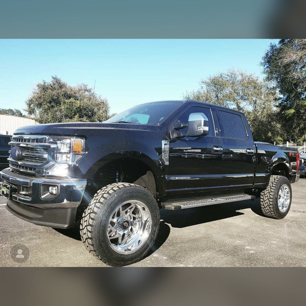 2017+ Ford Super Duty F-250/350/450 3/4", 1" & 1.375" front bumper spacer kit — installed view 2 showing bumper and tire clearance