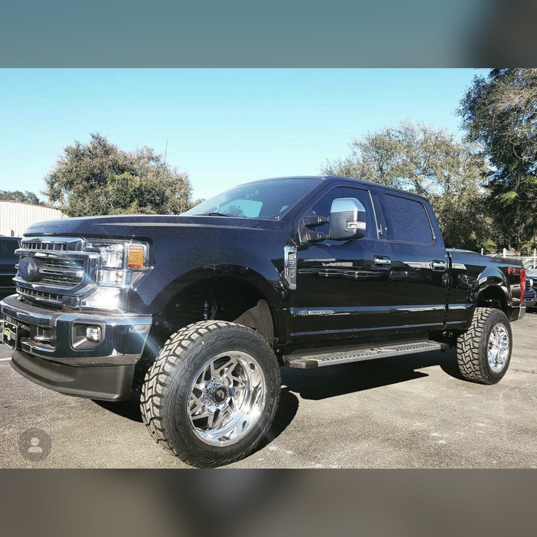 2017+ Ford Super Duty F-250/350/450 3/4", 1" & 1.375" front bumper spacer kit — installed view 2 showing bumper and tire clearance