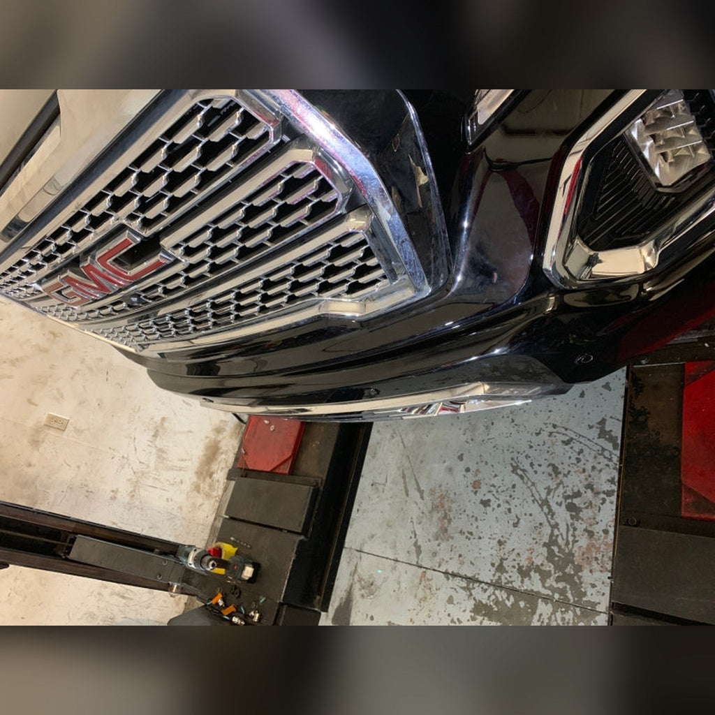 2019+ GMC Sierra 1500 3/4" front bumper spacer kit — installed view 2 showing bumper and tire clearance