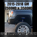 2015-2019 GMC Sierra 2500HD/3500HD with 3/4" front bumper spacer kit installed — bolt-on, no-cut tire clearance