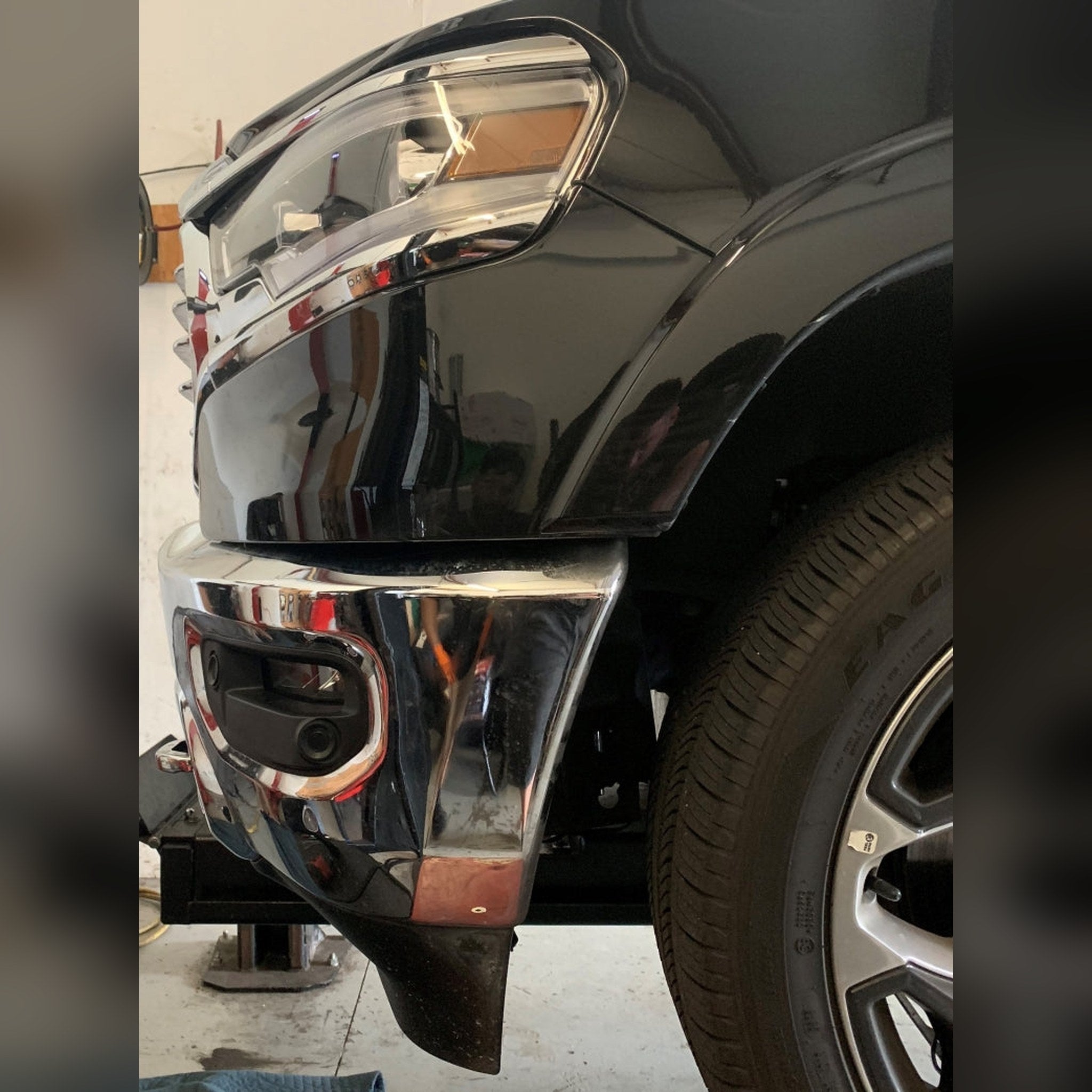 2019+ Ram 1500 with 1/2" front bumper spacer kit installed — bolt-on, no-cut tire clearance