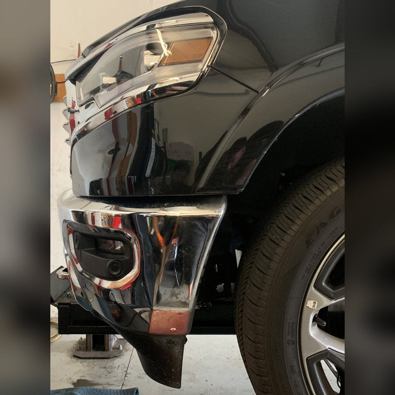 2019+ Ram 1500 with 1/2" front bumper spacer kit installed — bolt-on, no-cut tire clearance
