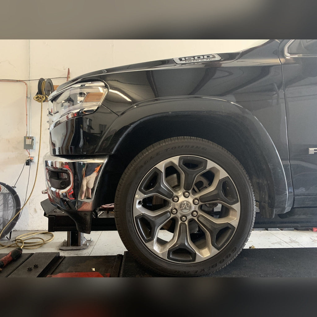 2019+ Ram 1500 1/2" front bumper spacer kit — installed view 2 showing bumper and tire clearance