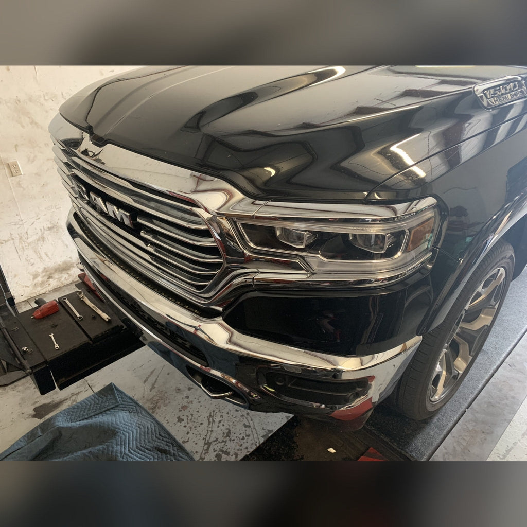 2019+ Ram 1500 1/2" front bumper spacer kit — installed view 3 showing bumper and tire clearance