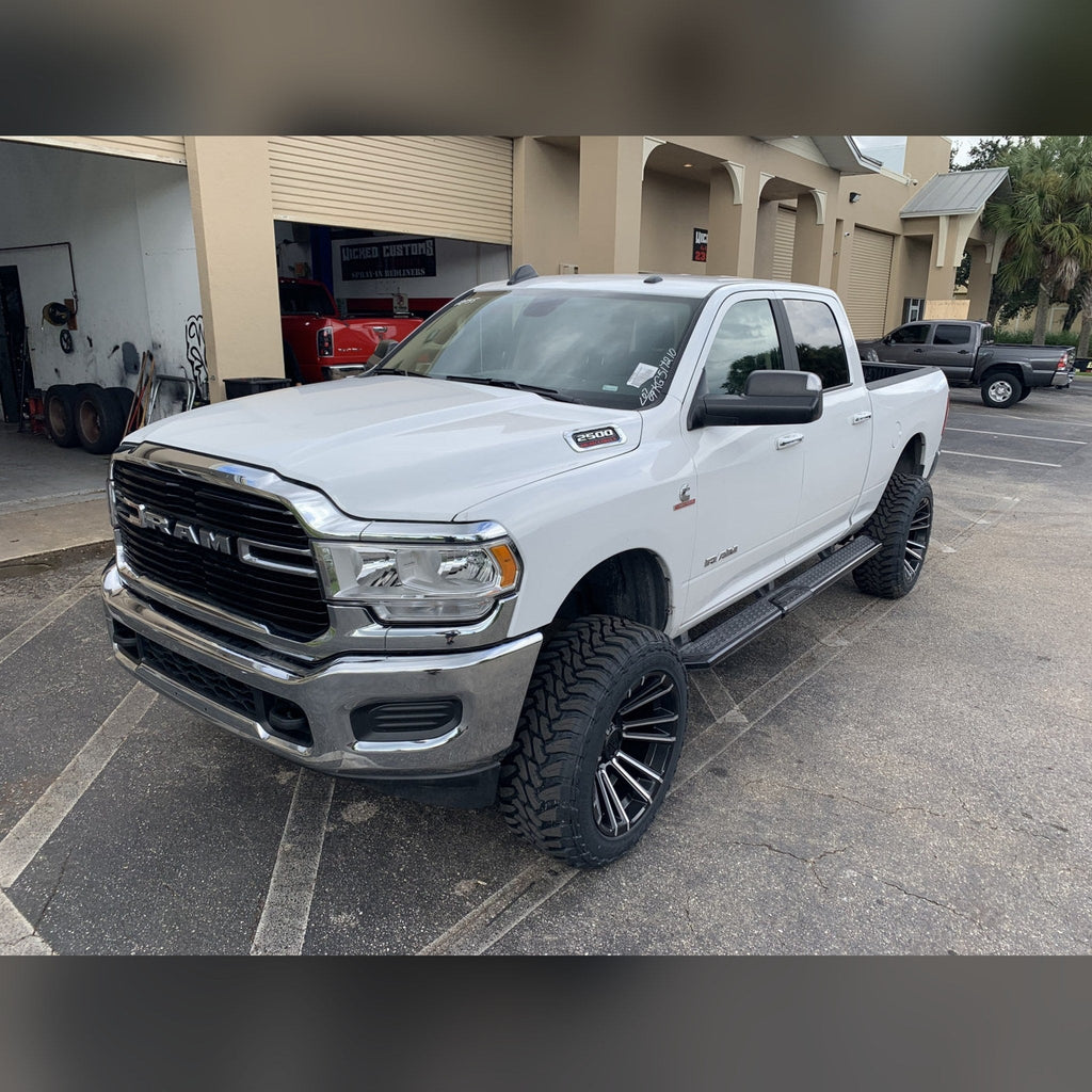 2019+ Ram 2500/3500 1/2" front bumper spacer kit — installed view 2 showing bumper and tire clearance