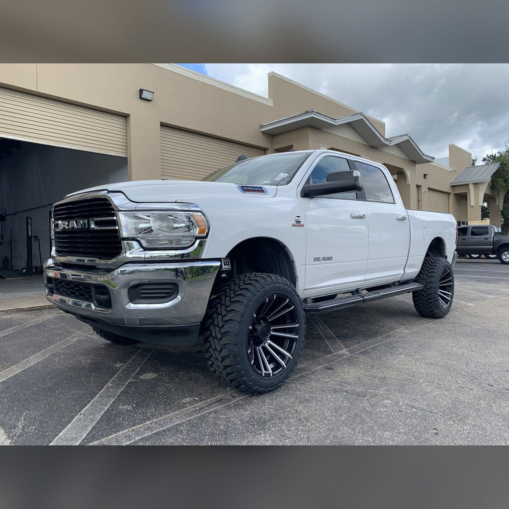 2019+ Ram 2500/3500 1/2" front bumper spacer kit — installed view 3 showing bumper and tire clearance