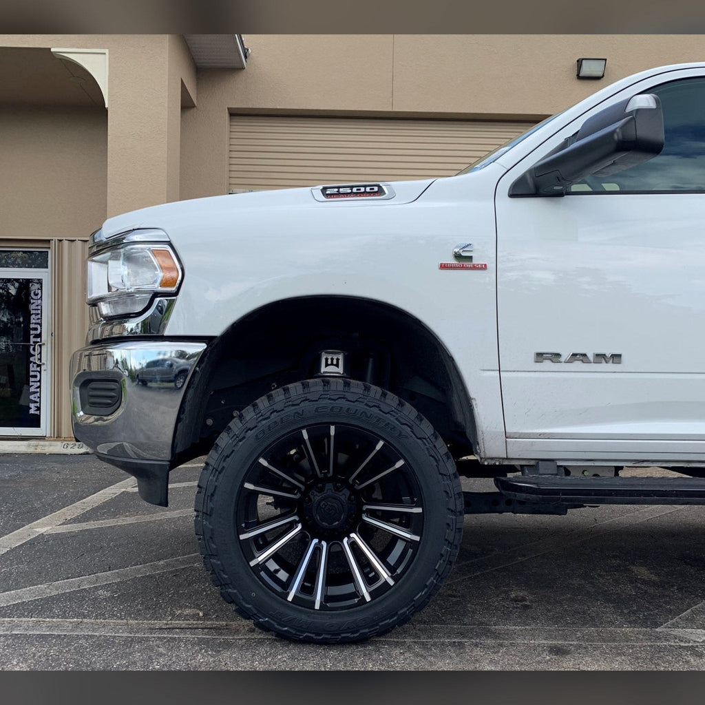 2019+ Ram 2500/3500 1/2" front bumper spacer kit — installed view 4 showing bumper and tire clearance